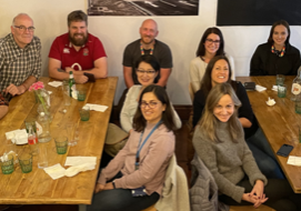 UoB Diabetes group photo group of males and females from the University of Bristol, sitting around two tables